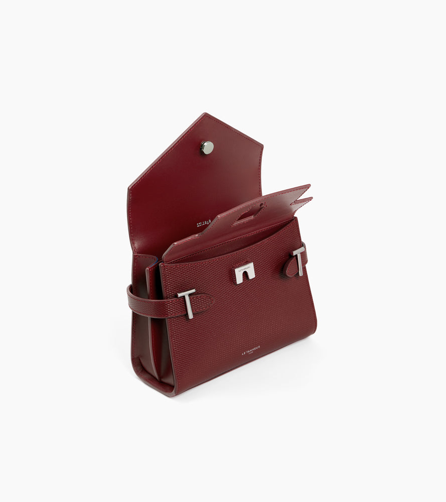 Pequeño bolso de mano con doble solapa Emilie en cuero firma T.